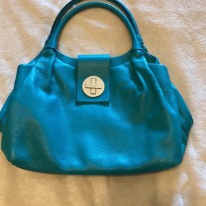 Kate Spade teal hand bag with metal front clasp